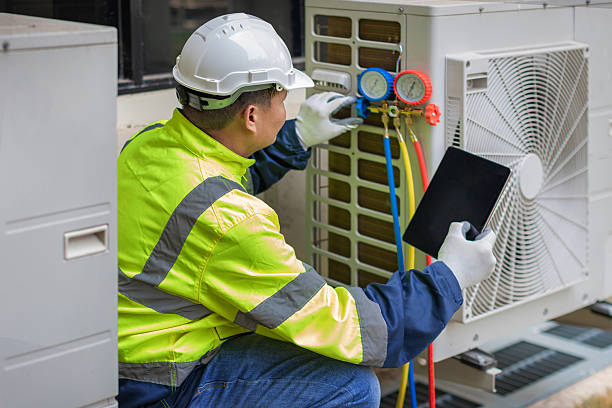 Professional Air Duct Cleaning technician working in Winthrop, MA